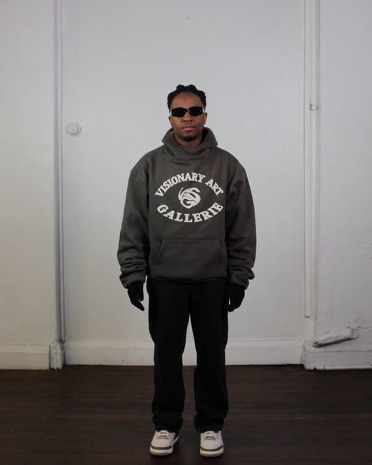 Product image ofVision studios' Visionary art gallerie hoodie in charcoal green and cream (size M)